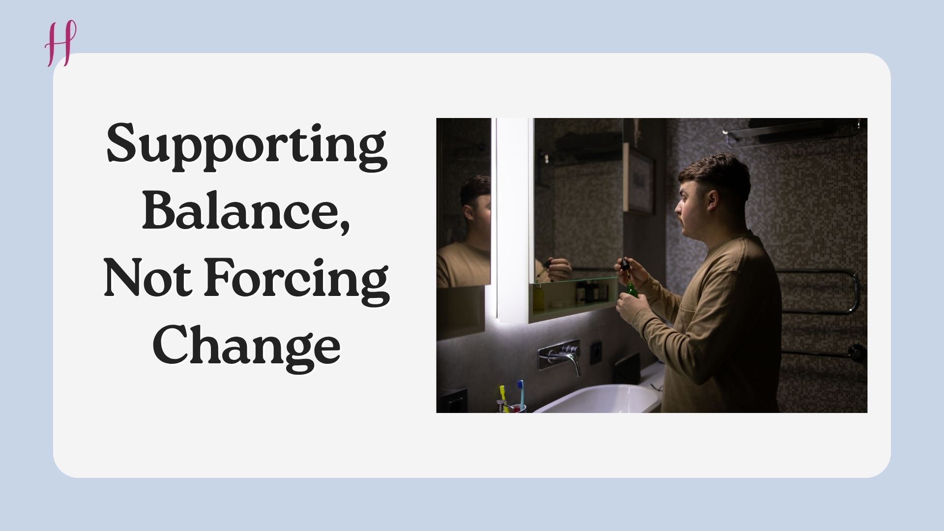 A man applies facial cream in front of a mirror.